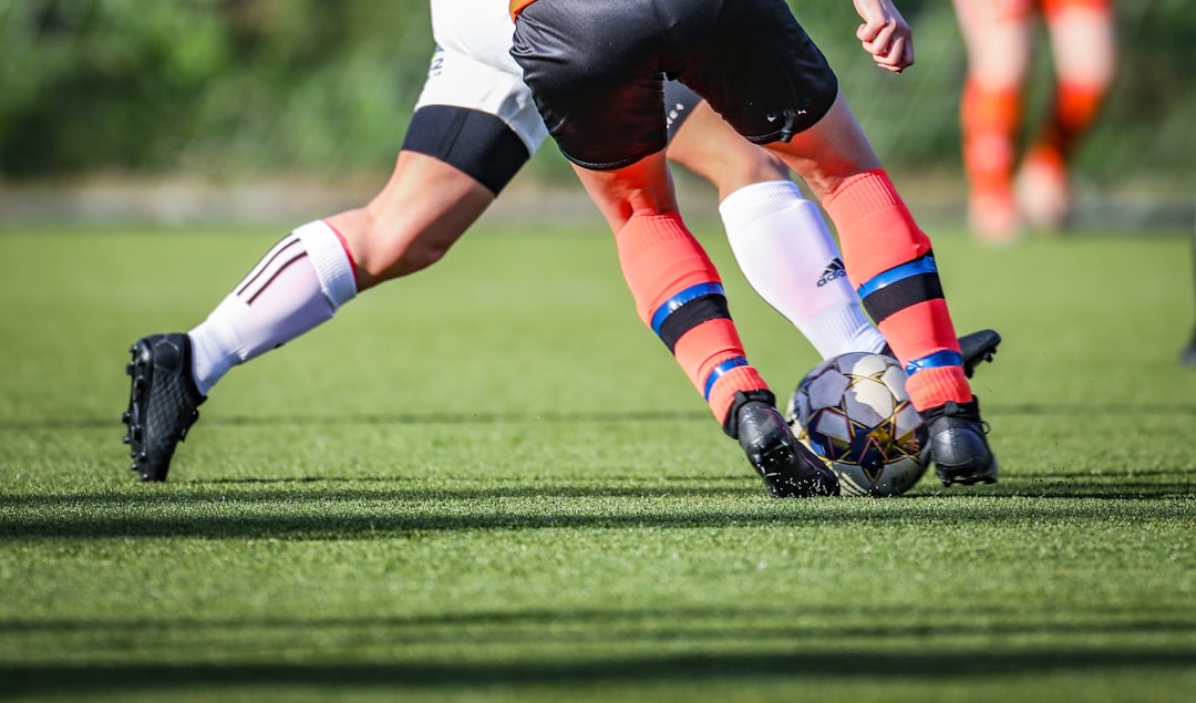The Art of Drawing Readers In: Your attractive post title goes here woman-in-black-and-white-soccer-jersey-kicking-soccer-ball-on-green-field-during-daytime-5ynjx9no3yc